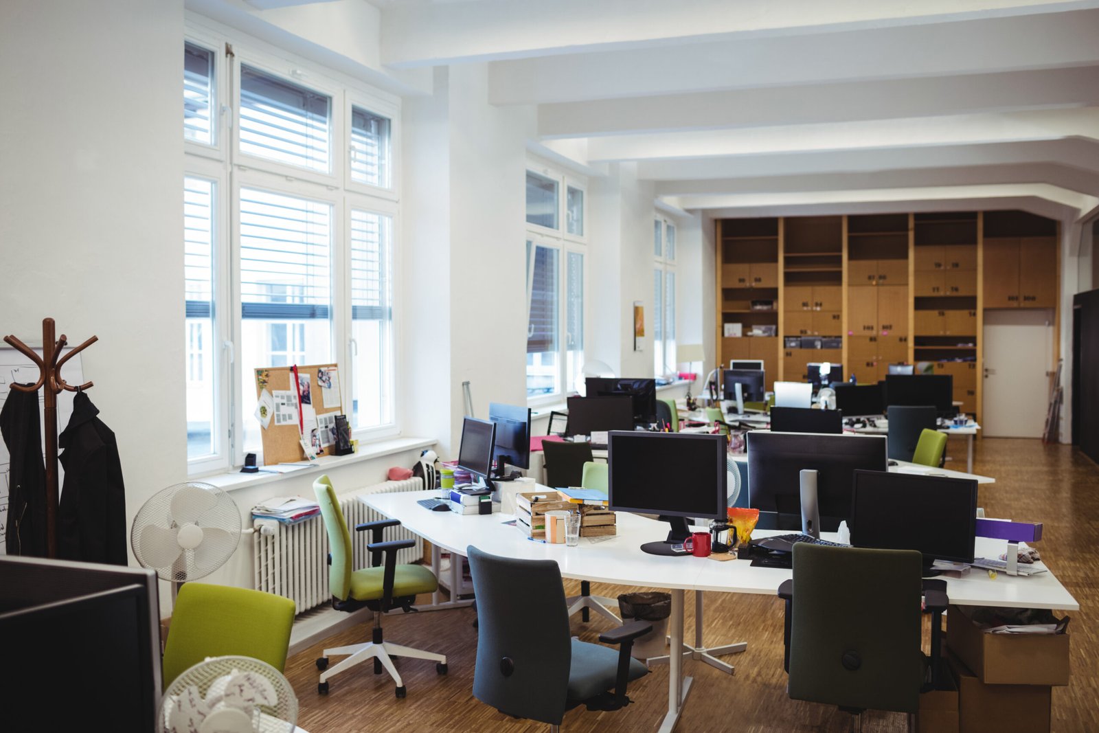 View of empty office workplace with table, chair and computer